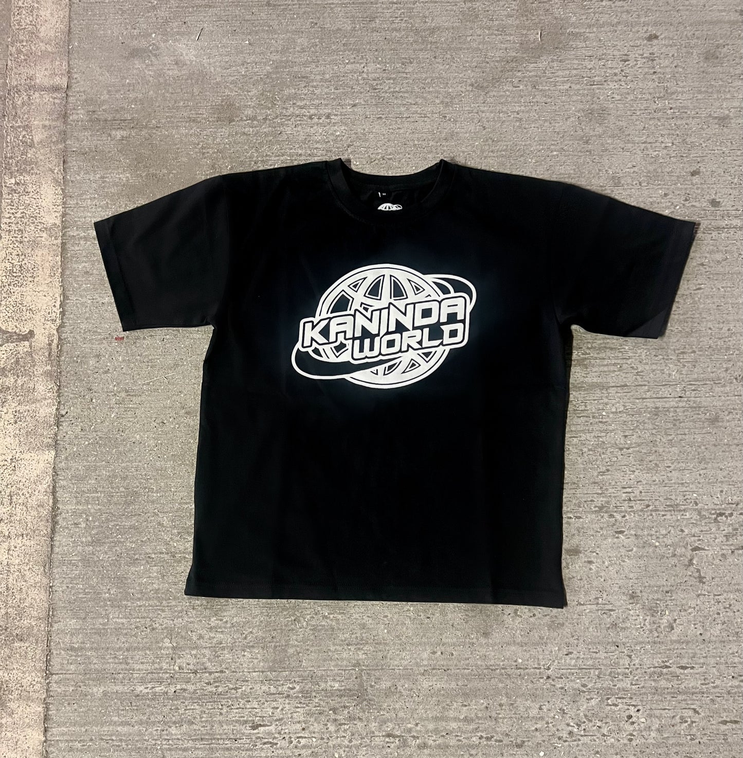 KANINDA WORLD BLACK T-SHIRT